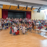 Twice annually the great choir and orchestra of the Circle of Friends come together to make CD recordings of self-composed pieces at which many young people also collaborate.